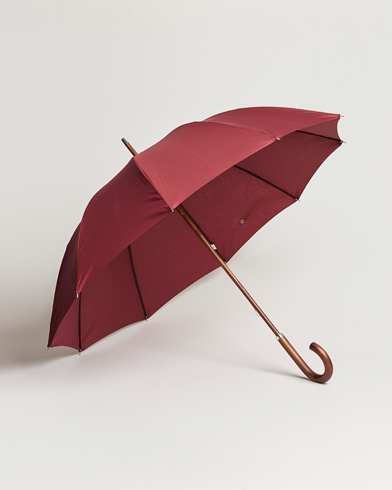 Mies | Tyylikkäänä sateella | Carl Dagg | Series 001 Umbrella Sullen Red