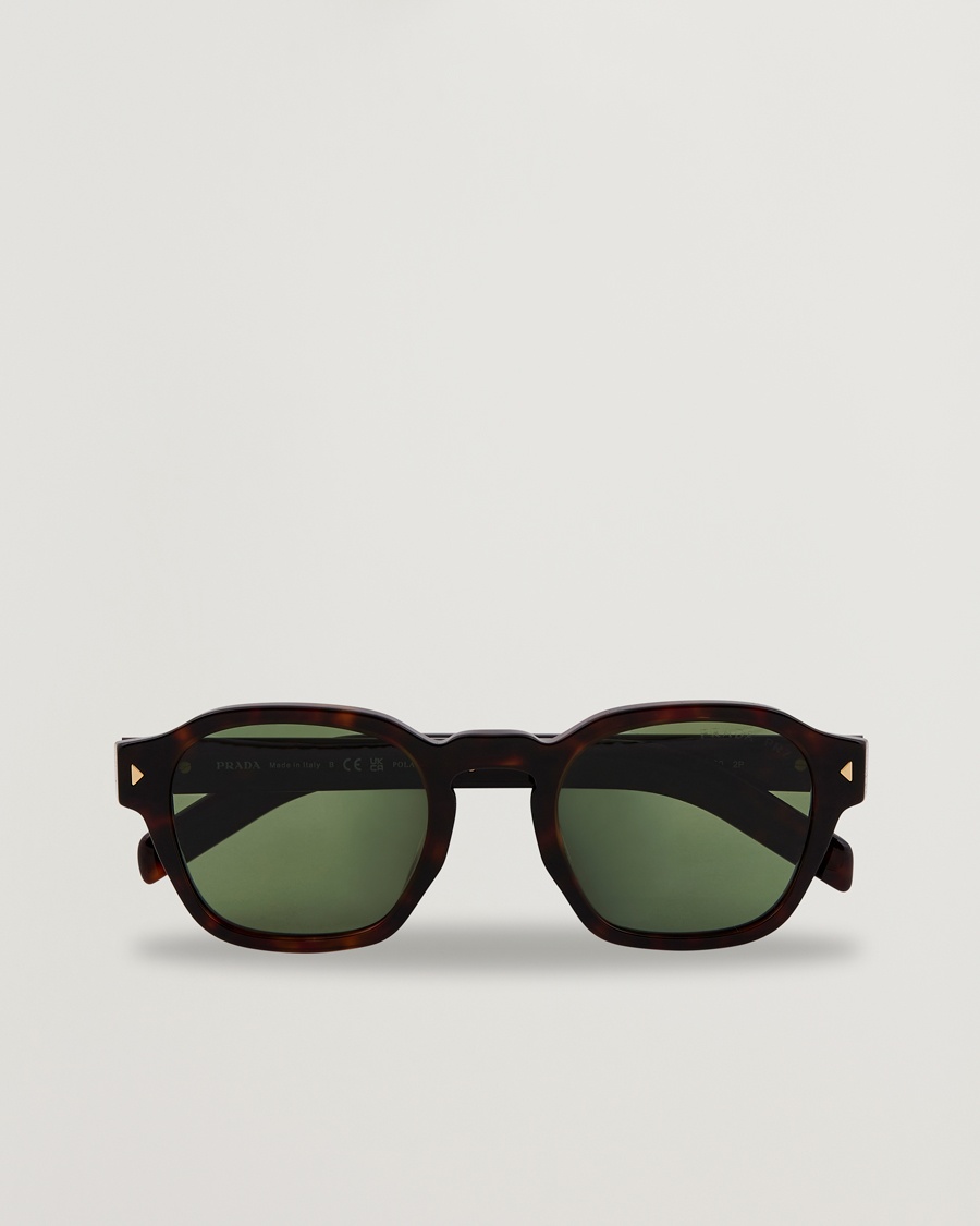 Prada Eyewear Prada 0PR A16S Sunglasses Radica Tortoise – Ruskea