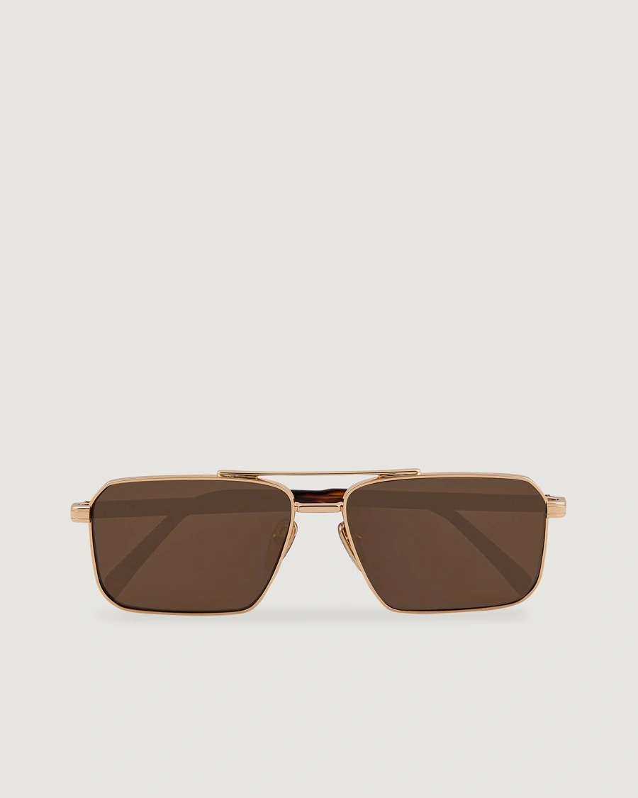 Prada Eyewear Prada 0PR A57S Metal Sunglasses Gold – Kulta