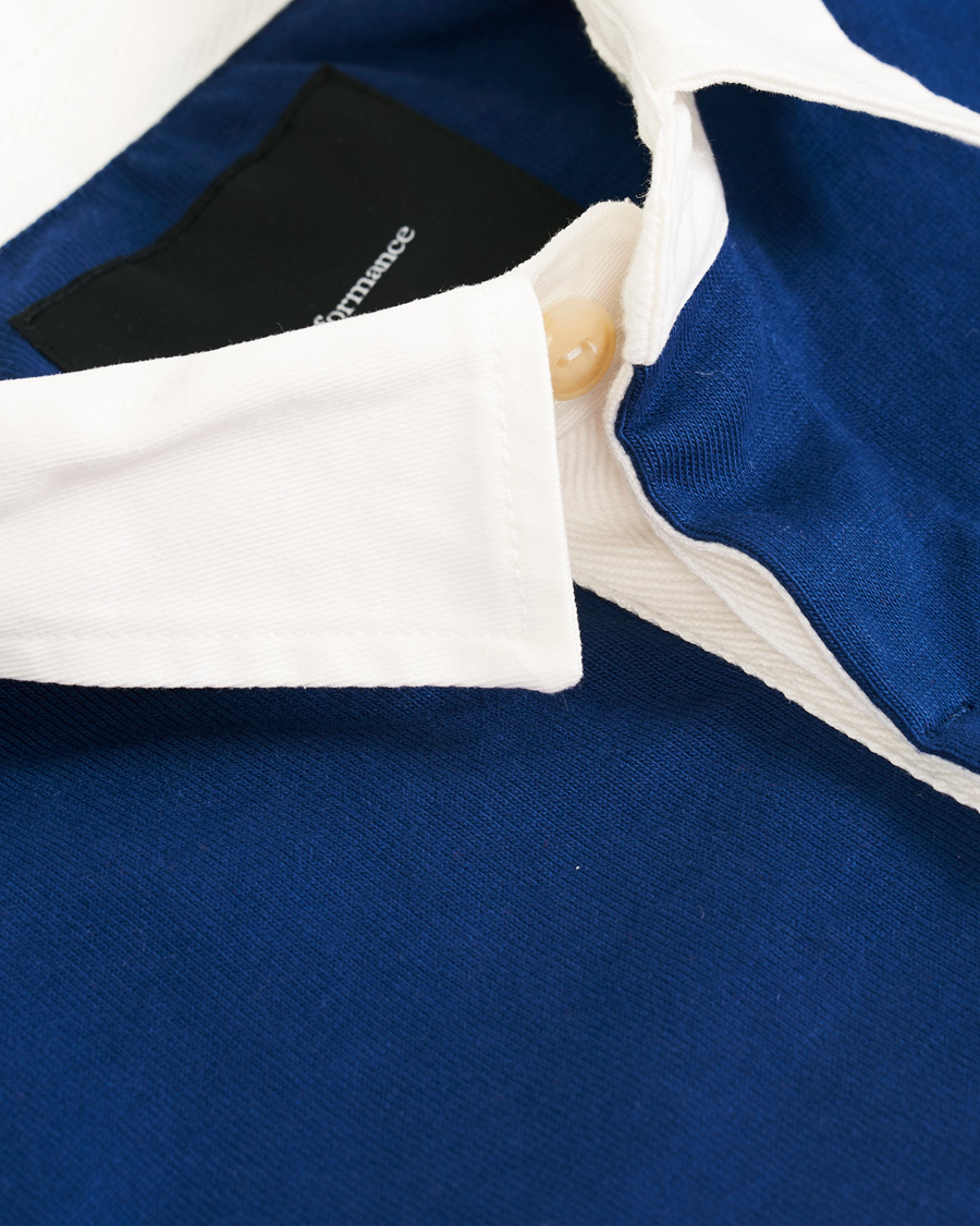 Mies | Puserot | Peak Performance | Rugby Blue/Orange/White