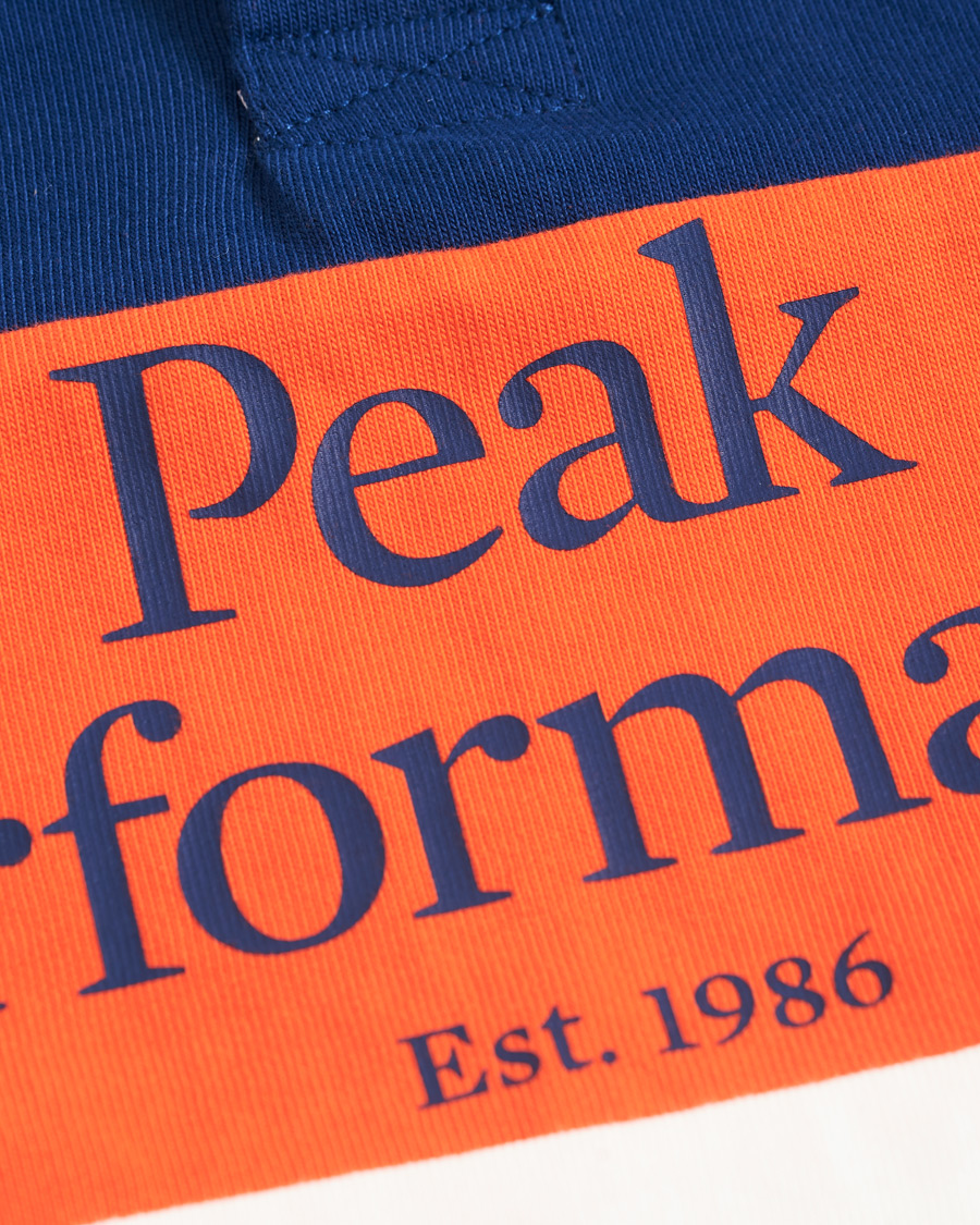 Mies | Puserot | Peak Performance | Rugby Blue/Orange/White