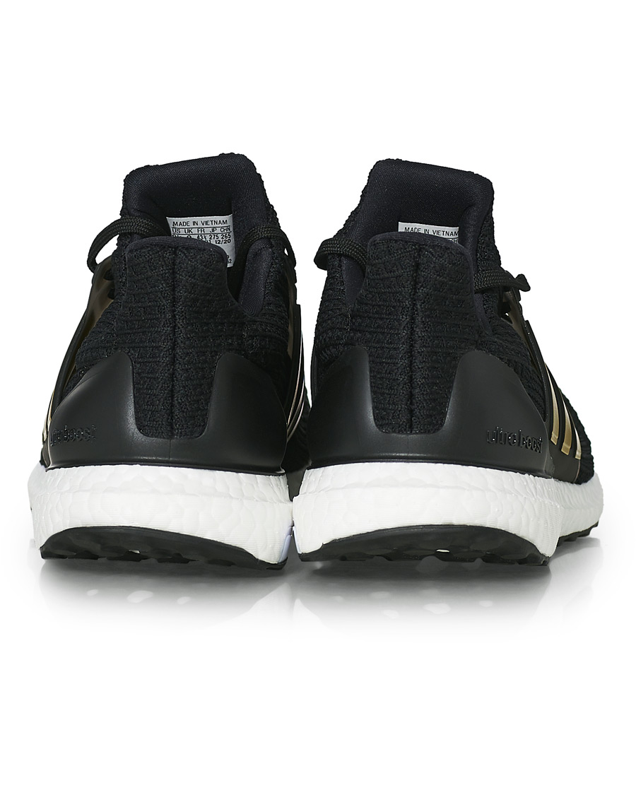 Mies | adidas Performance Ultraboost 4.0 DNA Sneaker Core Black/Gold | adidas Performance | Ultraboost 4.0 DNA Sneaker Core Black/Gold