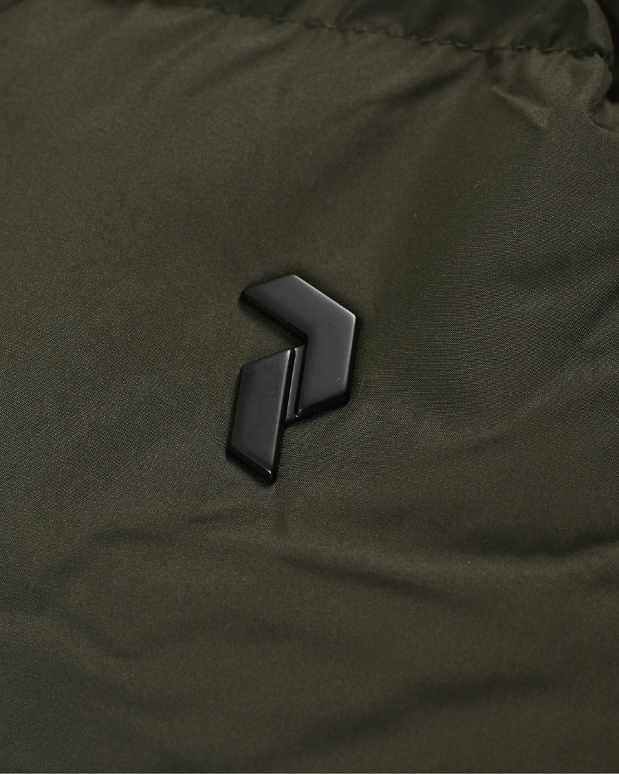Mies | Takit | Peak Performance | Rivel Down Hooded Jacket Olive Extreme