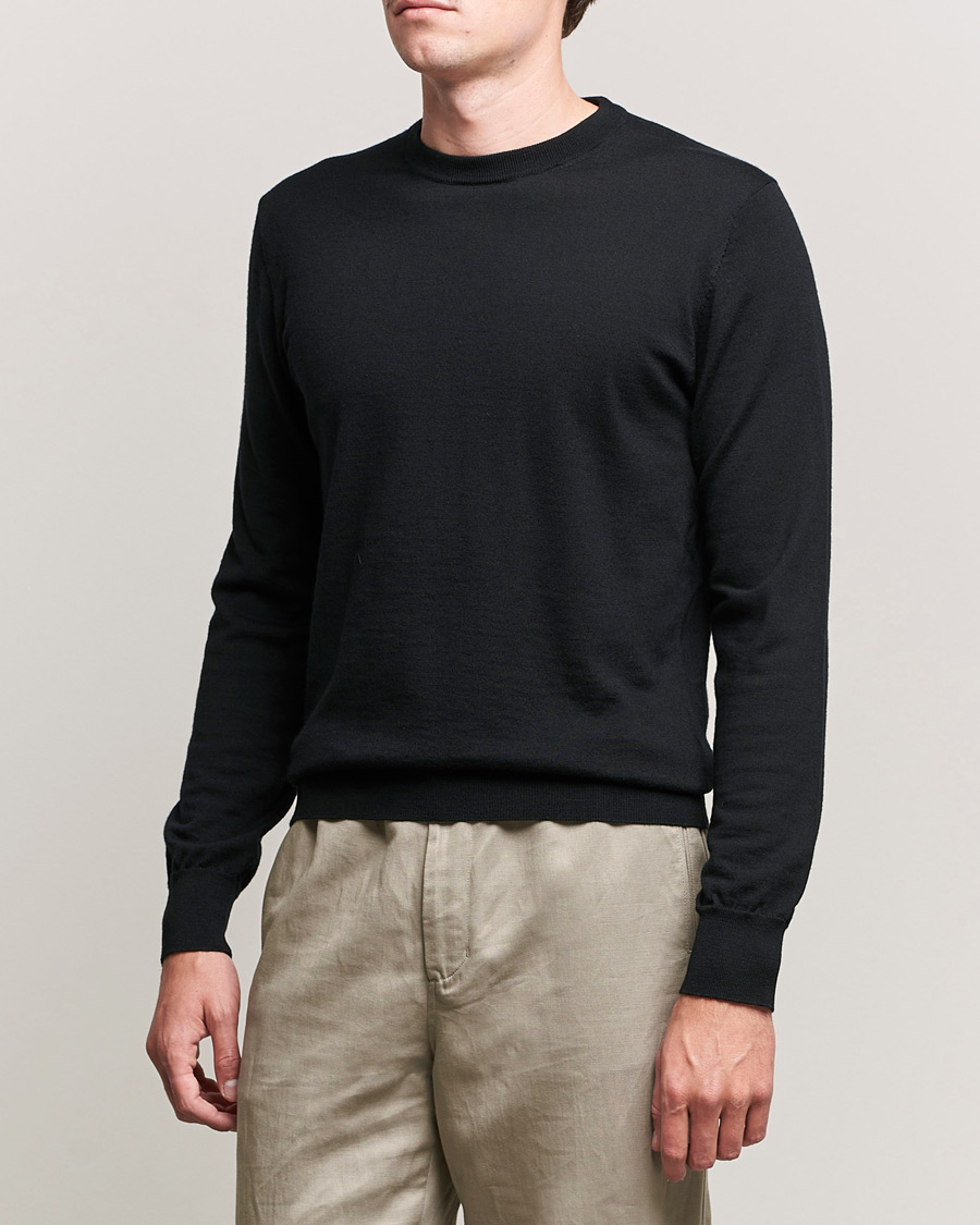 Mies | O-aukkoiset neulepuserot | Filippa K | Merino Round Neck Sweater Black