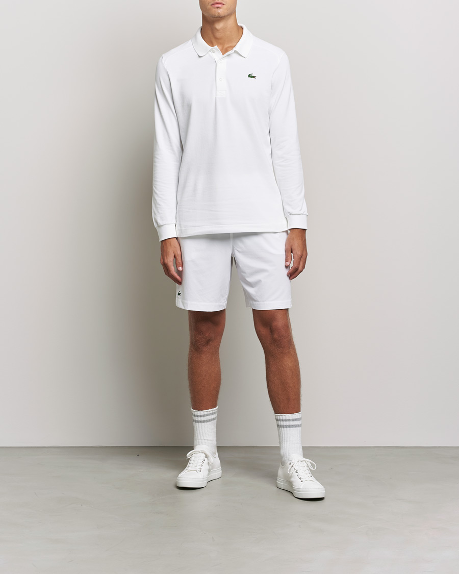 Mies |  | Lacoste Sport | Performance Shorts White/Navy Blue