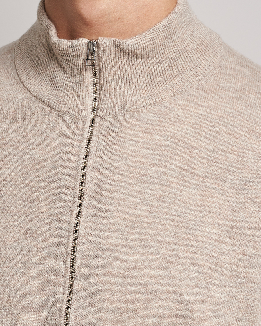 Mies | Puserot | Tiger of Sweden | Owain Merino Half Zip Sweater Dark White