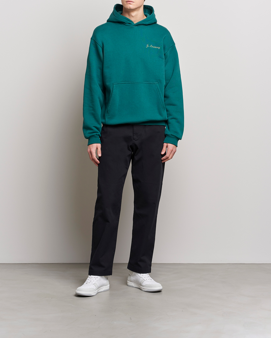 Mies | Puserot | J.Lindeberg | Karson Graphic Organic Cotton Hoodie Rain Forest