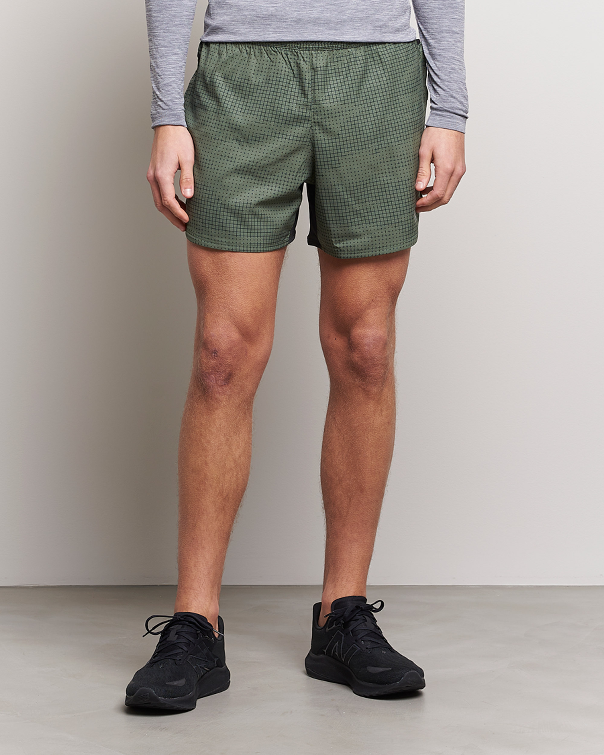 Mies | Shortsit | New Balance Running | Impact Run 5 Inch Shorts Deep Olive
