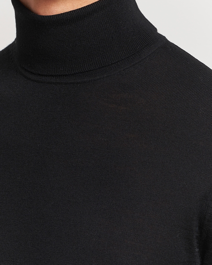 Mies | Puserot | Tiger of Sweden | Nevile Extra Fine Merino Polo Black