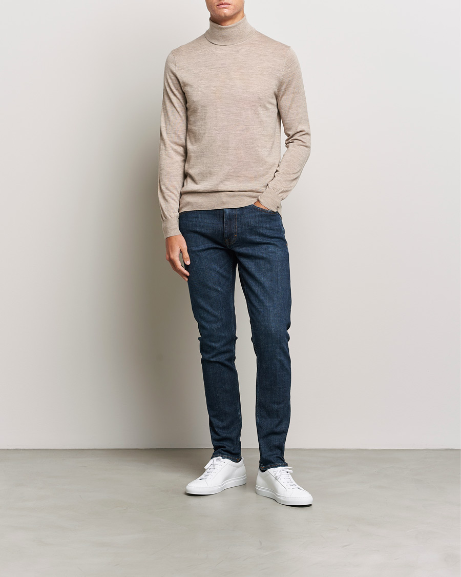 Mies | Puserot | Tiger of Sweden | Nevile Extra Fine Merino Polo Beige Melange