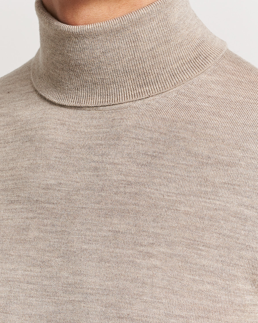 Mies | Puserot | Tiger of Sweden | Nevile Extra Fine Merino Polo Beige Melange