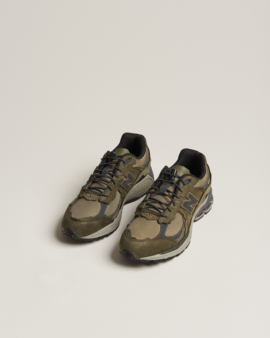 Mies | New Balance 2002R Protection Pack Sneakers Dark Moss | New Balance | 2002R Protection Pack Sneakers Dark Moss