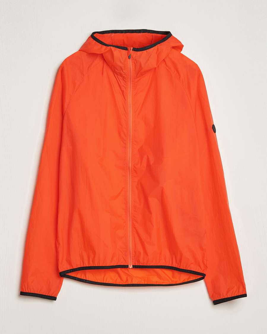 Mies | Running | District Vision | Ultralight Packable DWR Wind Jacket Tangerine