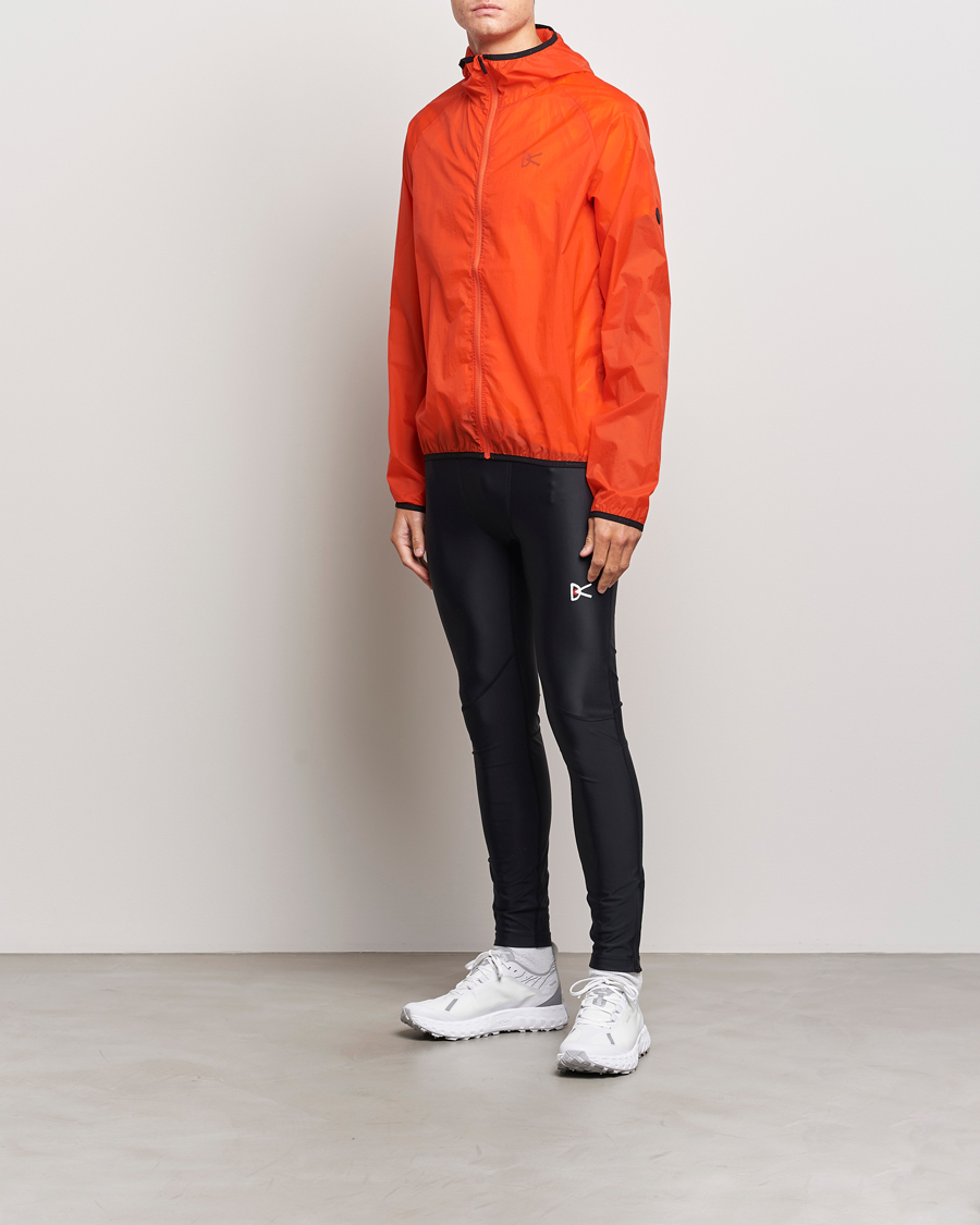 Mies | Takit | District Vision | Ultralight Packable DWR Wind Jacket Tangerine