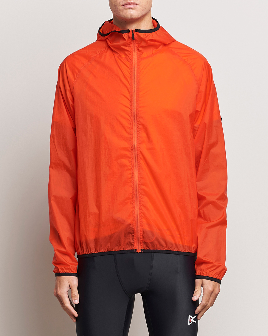 Mies | Running | District Vision | Ultralight Packable DWR Wind Jacket Tangerine