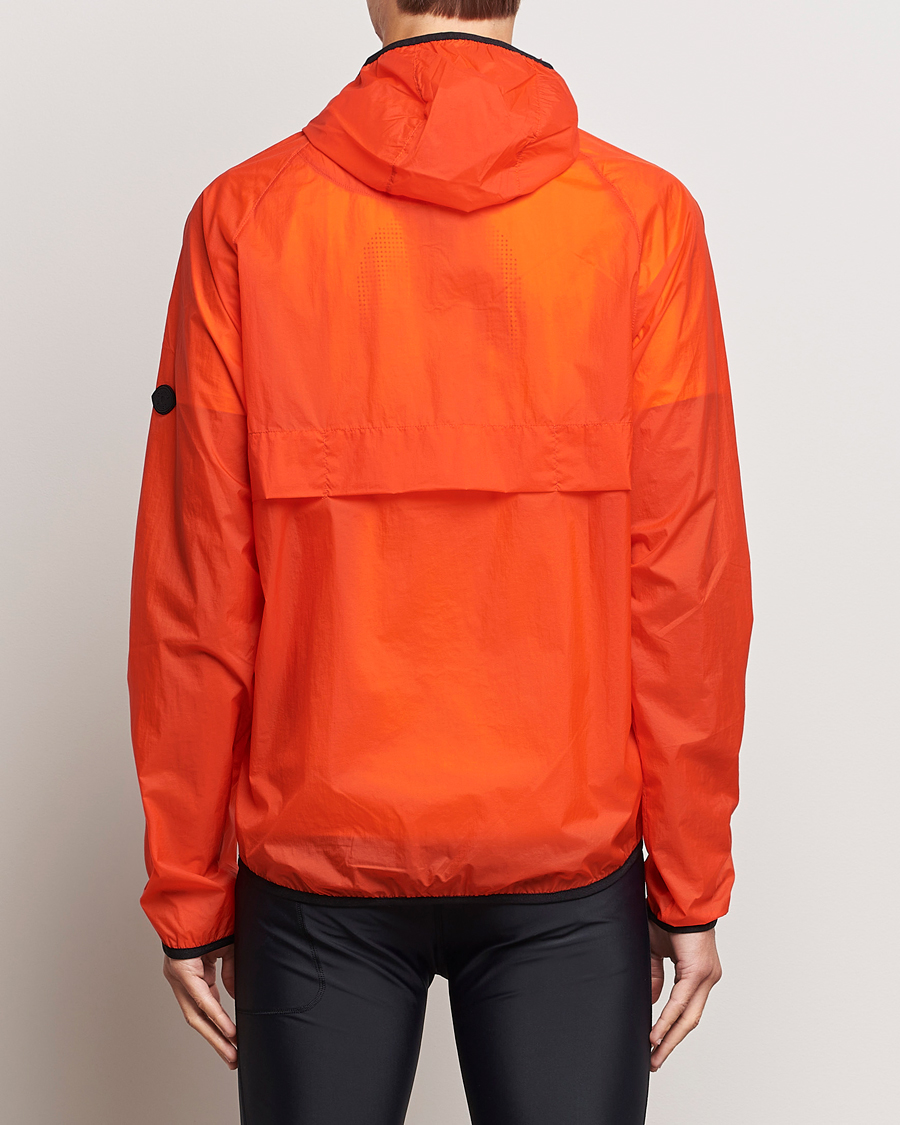Mies | Takit | District Vision | Ultralight Packable DWR Wind Jacket Tangerine