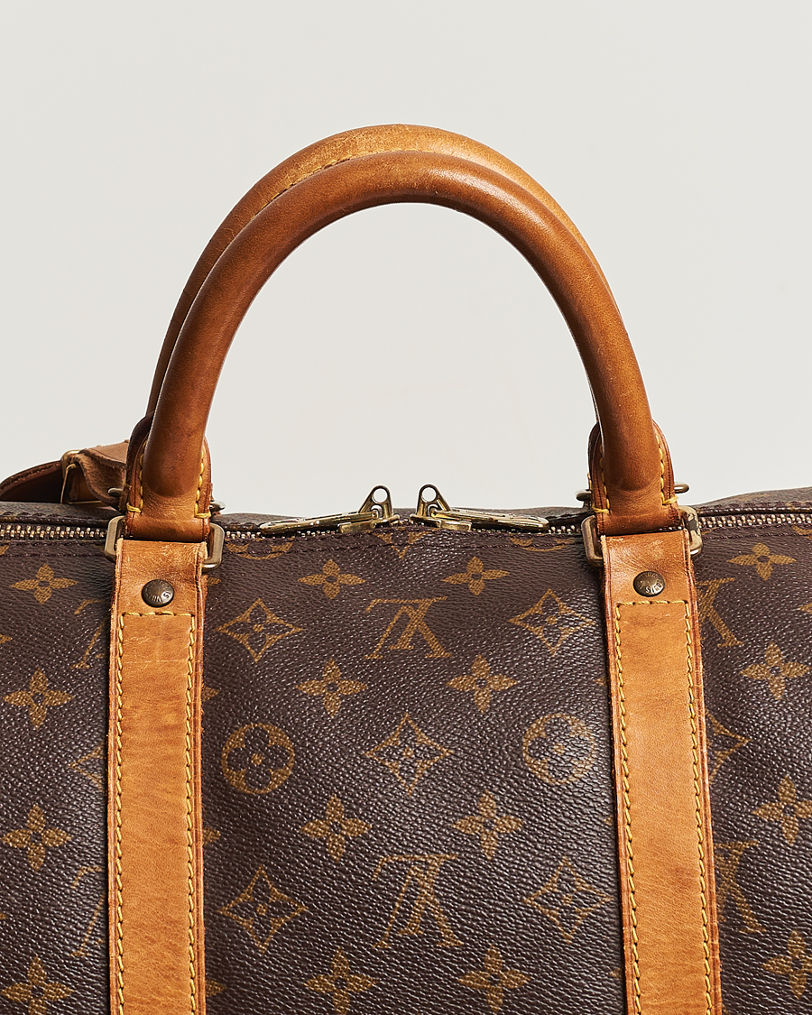 Mies | Louis Vuitton Pre-Owned Keepall Bandoulière 55 Bag Monogram | Louis Vuitton Pre-Owned | Keepall Bandoulière 55 Bag Monogram