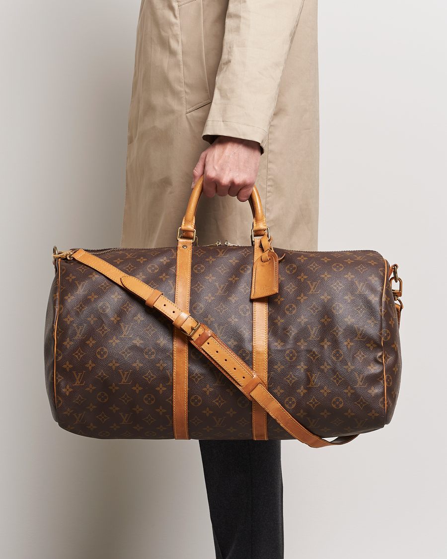 Mies | Louis Vuitton Pre-Owned Keepall Bandoulière 55 Bag Monogram | Louis Vuitton Pre-Owned | Keepall Bandoulière 55 Bag Monogram