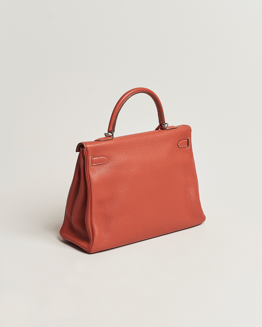 Mies | Hermès Pre-Owned Kelly 35 Handbag Taurillion Clemence Orange | Hermès Pre-Owned | Kelly 35 Handbag Taurillion Clemence Orange