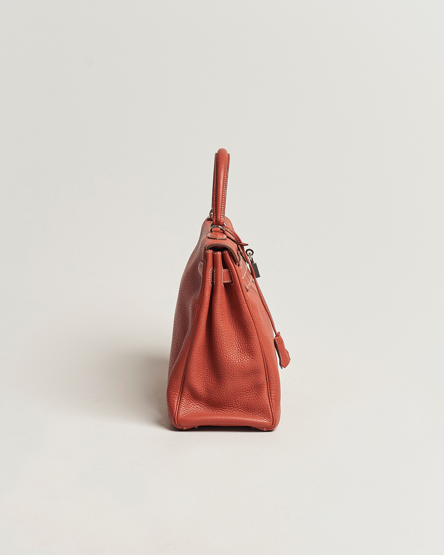 Mies | Hermès Pre-Owned Kelly 35 Handbag Taurillion Clemence Orange | Hermès Pre-Owned | Kelly 35 Handbag Taurillion Clemence Orange