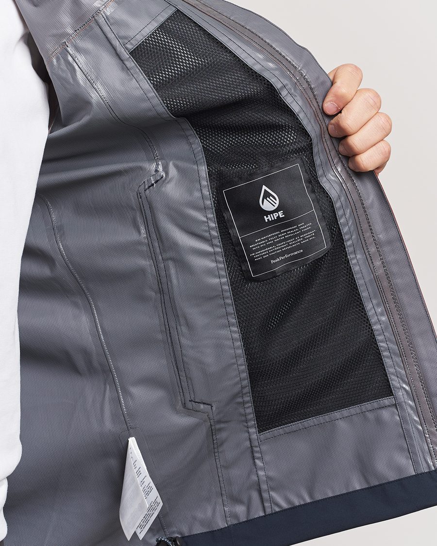 Mies | Takit | Peak Performance | Trail Hipe Hooded Jacket Spiced/Salute Navy/Desert
