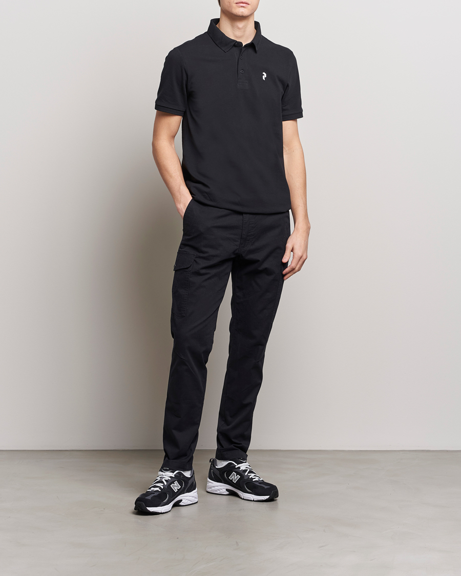 Mies | Pikeet | Peak Performance | Classic Cotton Polo Black