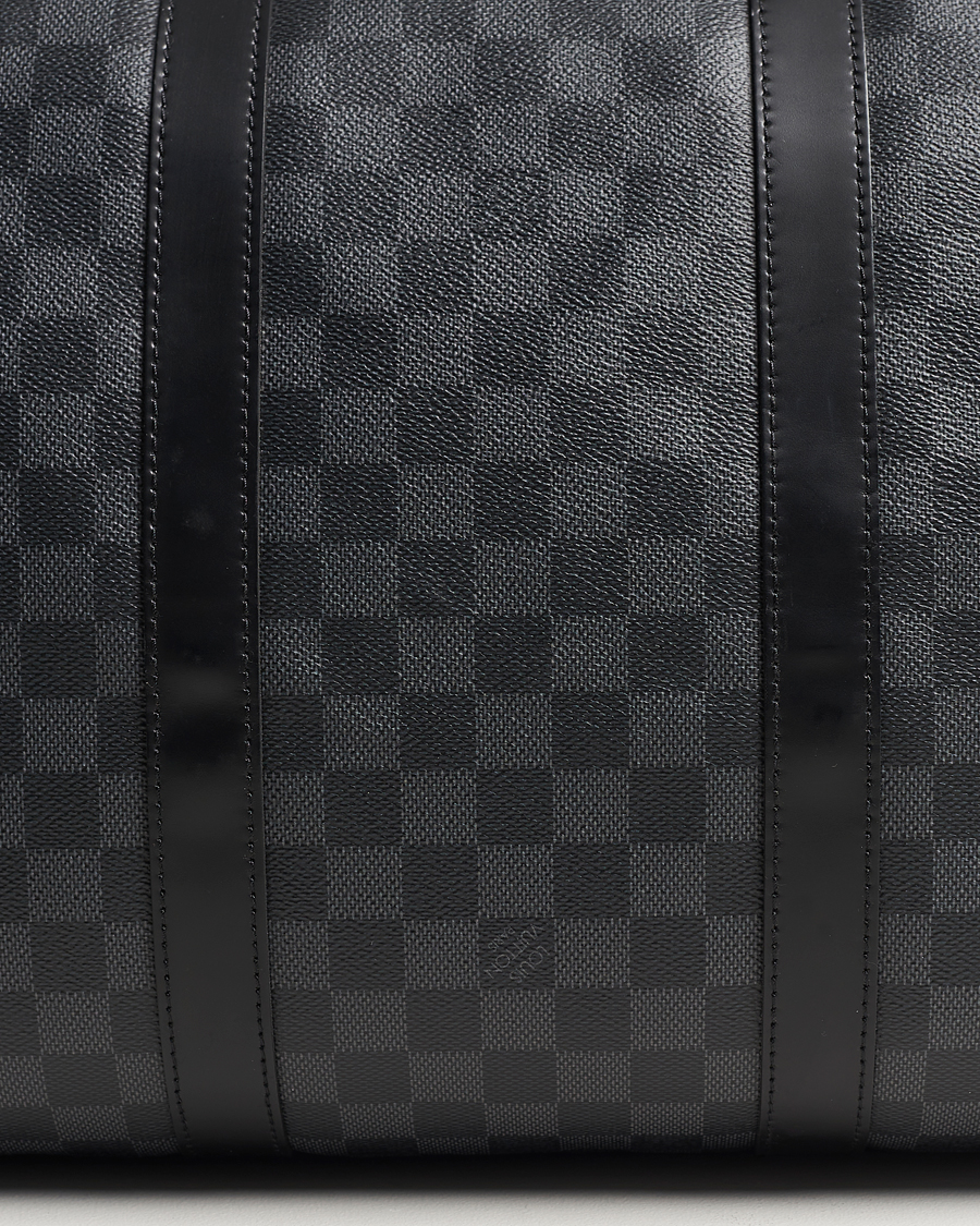 Mies | Louis Vuitton Pre-Owned Keepall Bandoulière 55 Damier Graphite | Louis Vuitton Pre-Owned | Keepall Bandoulière 55 Damier Graphite