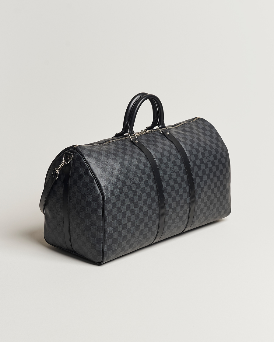 Mies | Louis Vuitton Pre-Owned Keepall Bandoulière 55 Damier Graphite | Louis Vuitton Pre-Owned | Keepall Bandoulière 55 Damier Graphite