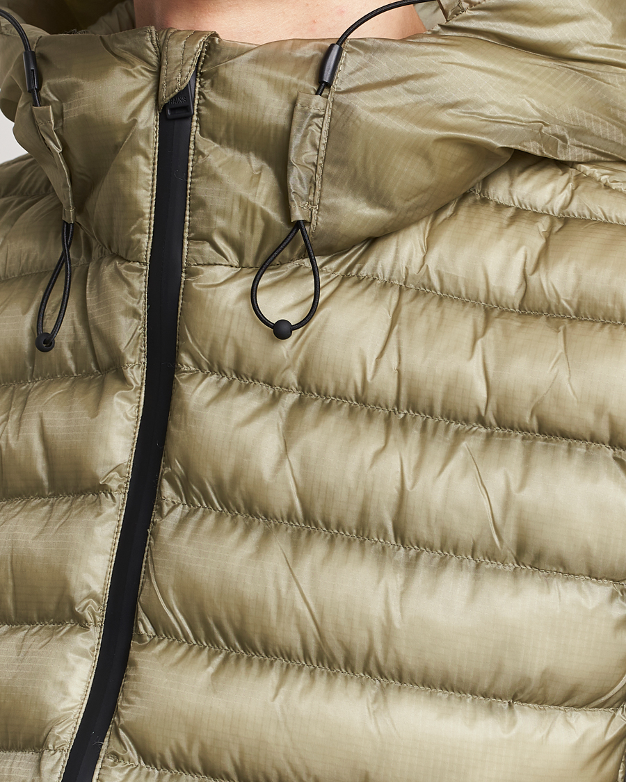 Mies | Takit | RAINS | Kaunas Hybrid Hooded Vest Earth