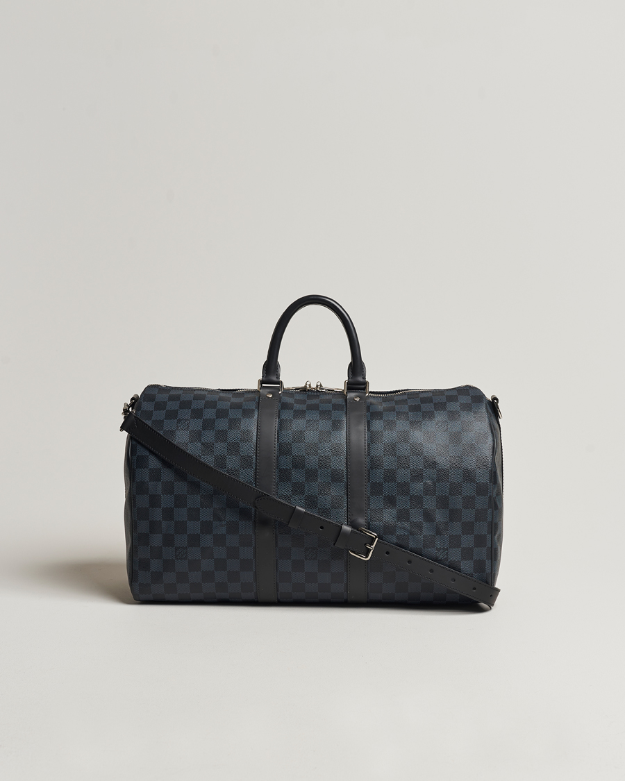 Mies | Louis Vuitton Pre-Owned Keepall Bandoulière 45 Damier Graphite | Louis Vuitton Pre-Owned | Keepall Bandoulière 45 Damier Graphite