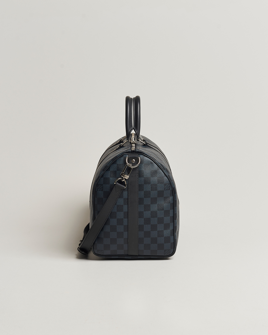 Mies | Louis Vuitton Pre-Owned Keepall Bandoulière 45 Damier Graphite | Louis Vuitton Pre-Owned | Keepall Bandoulière 45 Damier Graphite