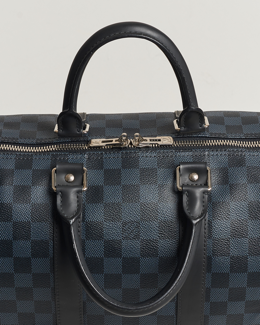 Mies | Louis Vuitton Pre-Owned Keepall Bandoulière 45 Damier Graphite | Louis Vuitton Pre-Owned | Keepall Bandoulière 45 Damier Graphite