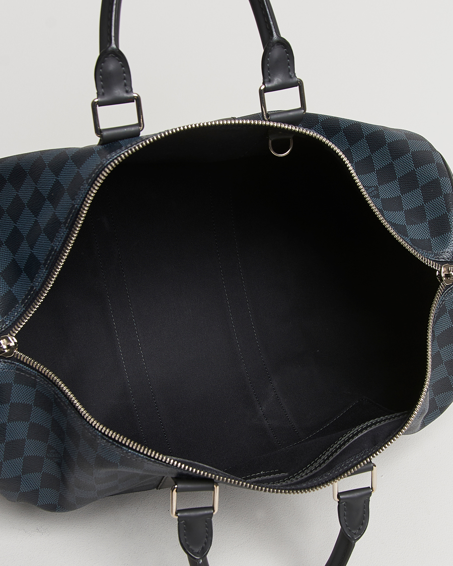 Mies | Louis Vuitton Pre-Owned Keepall Bandoulière 45 Damier Graphite | Louis Vuitton Pre-Owned | Keepall Bandoulière 45 Damier Graphite