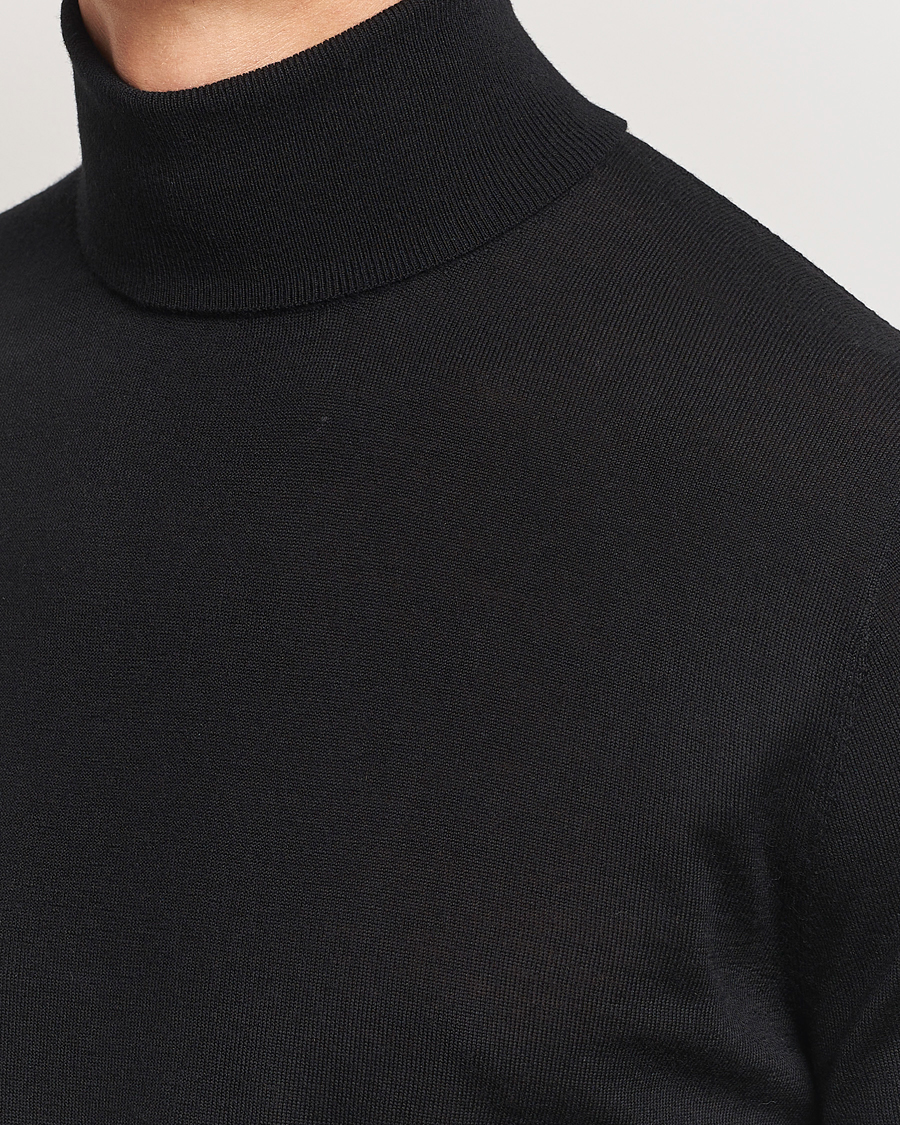 Mies | Puserot | Tiger of Sweden | Nevile Extra Fine Merino Polo Black