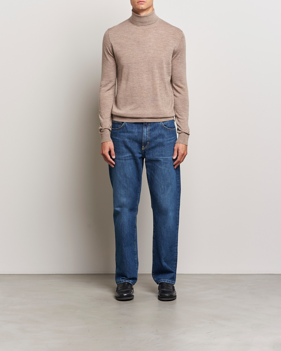 Mies | Puserot | Tiger of Sweden | Nevile Extra Fine Merino Polo Beige Melange