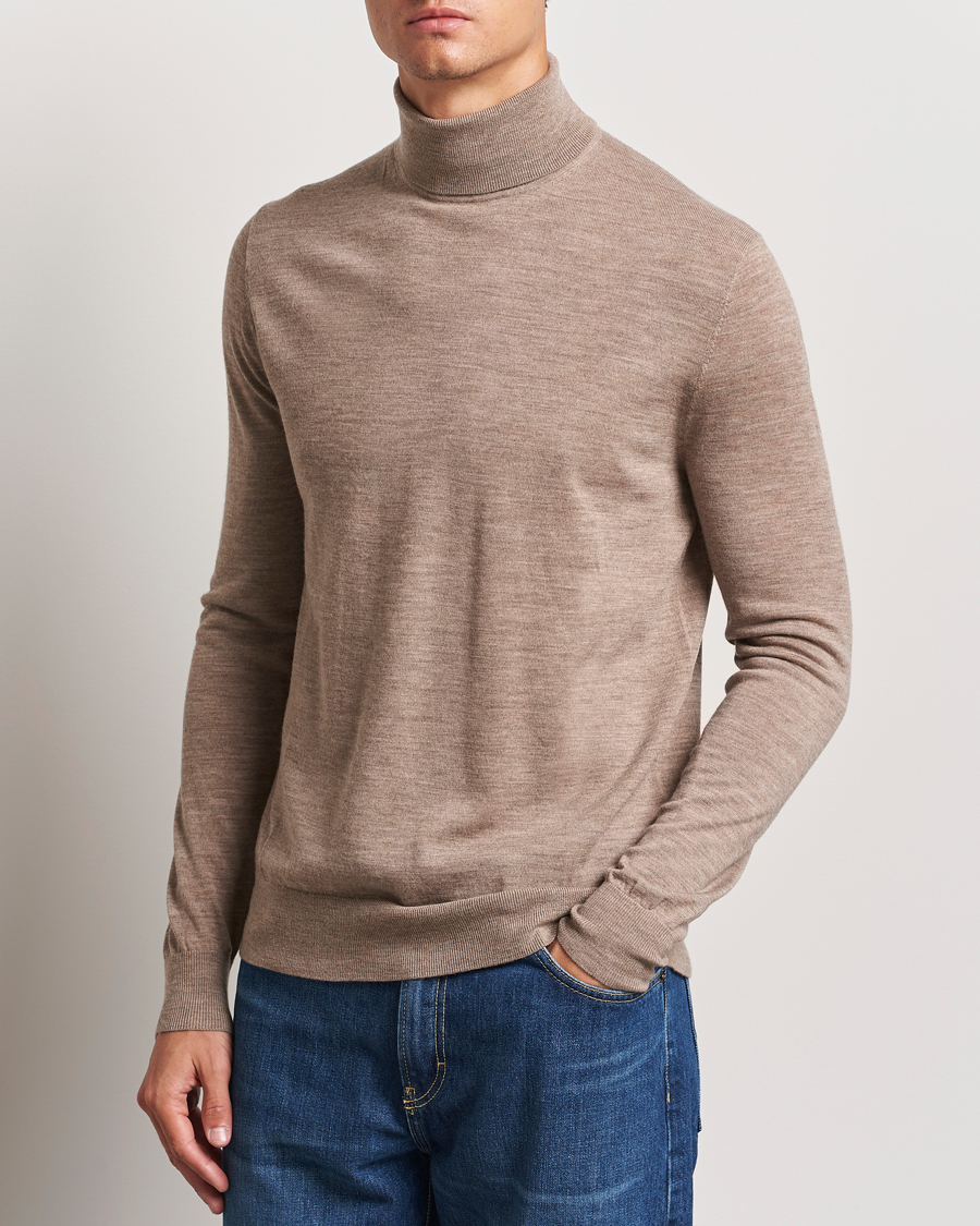 Mies | Puserot | Tiger of Sweden | Nevile Extra Fine Merino Polo Beige Melange