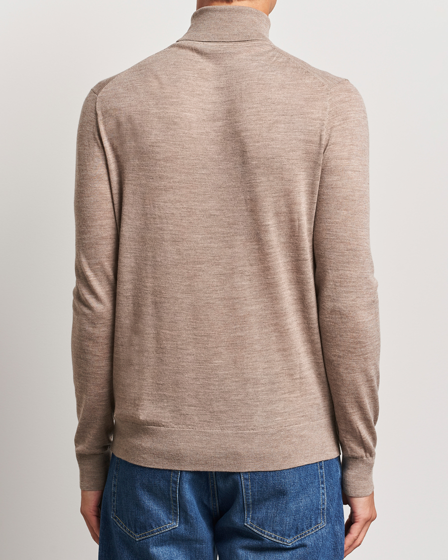 Mies | Puserot | Tiger of Sweden | Nevile Extra Fine Merino Polo Beige Melange