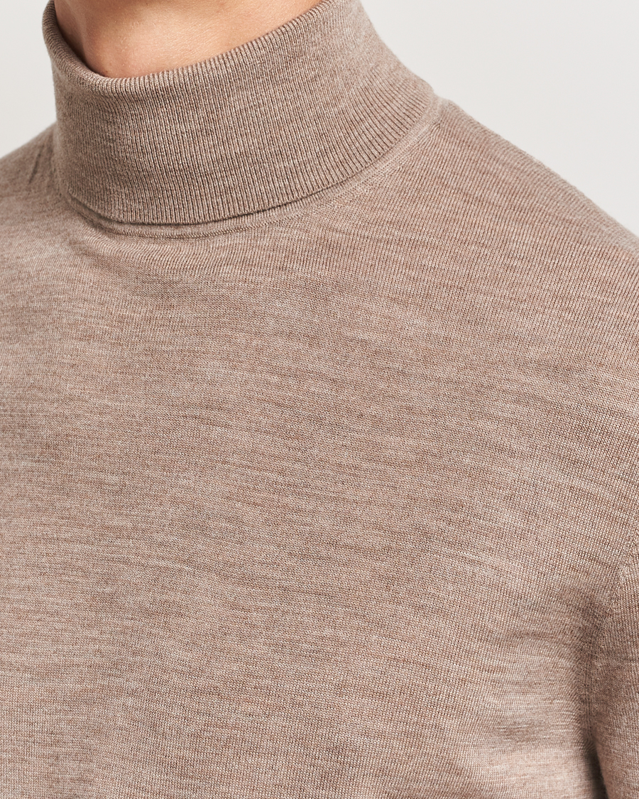 Mies | Puserot | Tiger of Sweden | Nevile Extra Fine Merino Polo Beige Melange