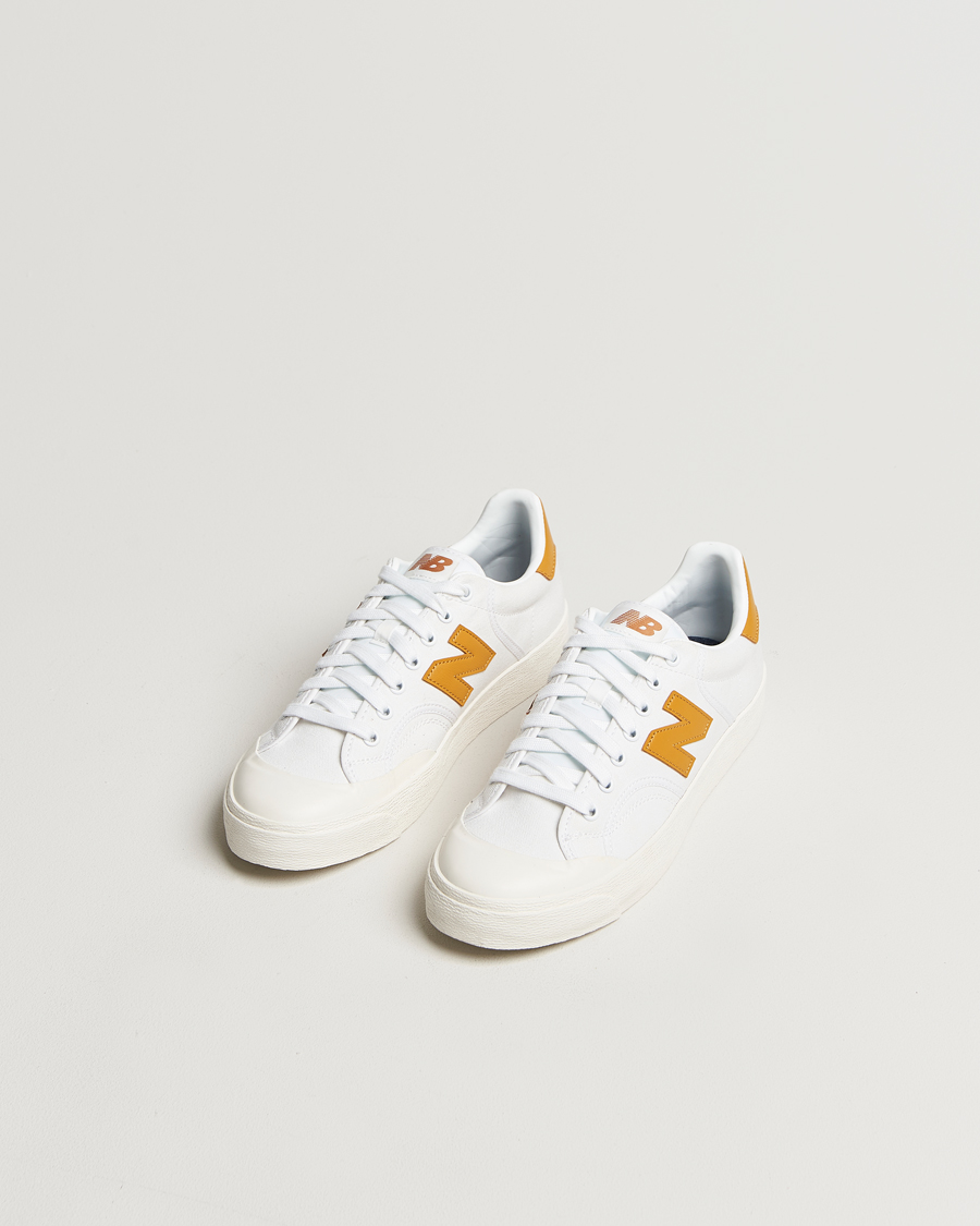 Mies | New Balance B100 Sneakers White/Yellow | New Balance | B100 Sneakers White/Yellow