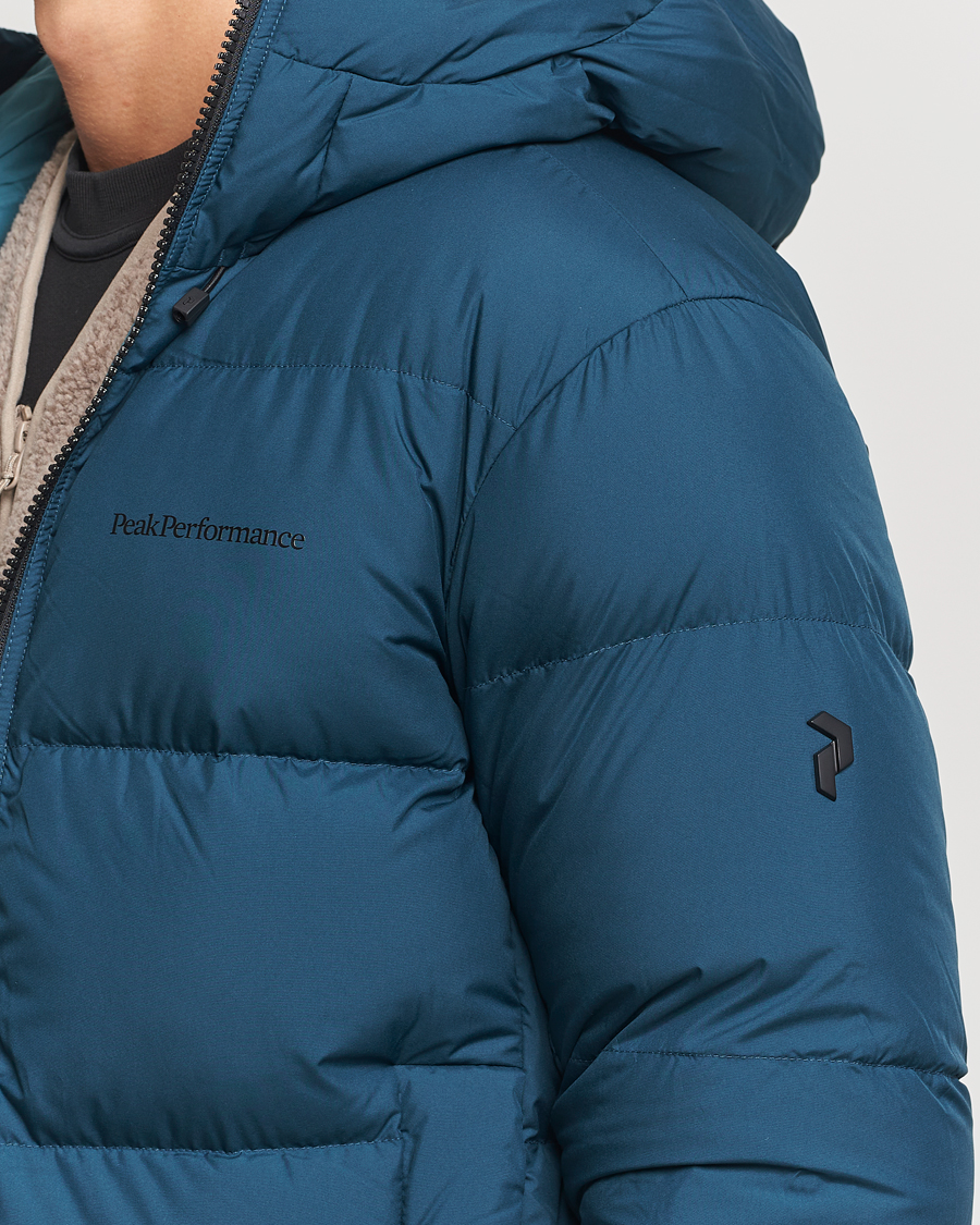 Mies | Takit | Peak Performance | Rivel Down Hooded Jacket Ininity Teel