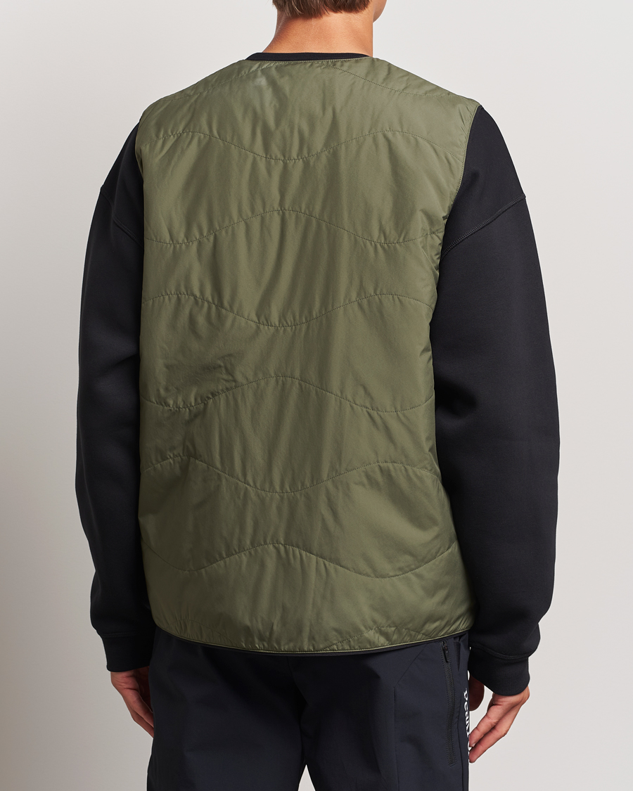 Mies | Takit | Peak Performance | Insulated Reversable Vest Pine Needle