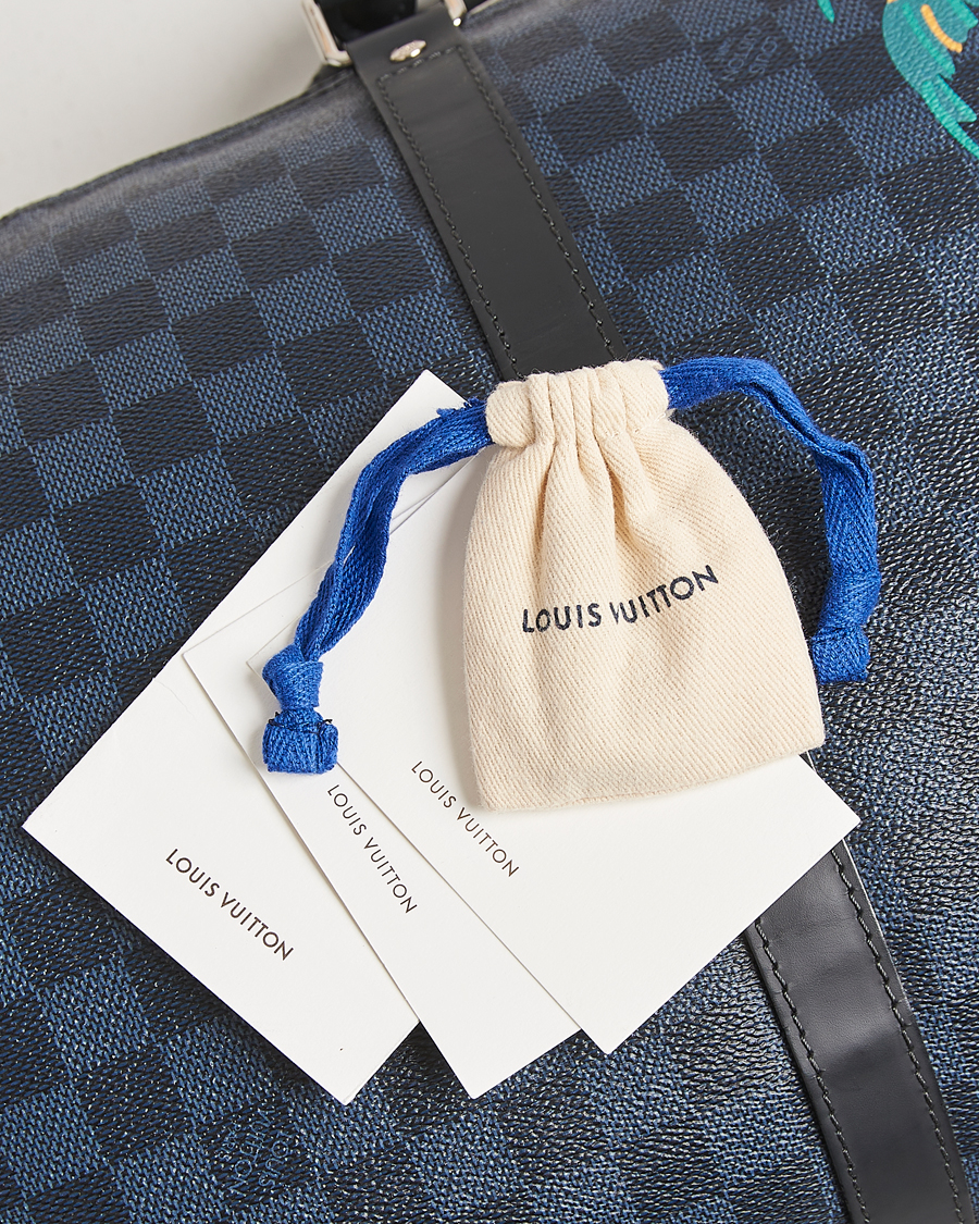 Mies | Louis Vuitton Pre-Owned Keepall Bandoulière 45 Damier Cobalt Jungle | Louis Vuitton Pre-Owned | Keepall Bandoulière 45 Damier Cobalt Jungle