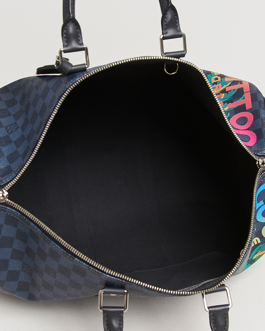 Mies | Louis Vuitton Pre-Owned Keepall Bandoulière 45 Damier Cobalt Jungle | Louis Vuitton Pre-Owned | Keepall Bandoulière 45 Damier Cobalt Jungle