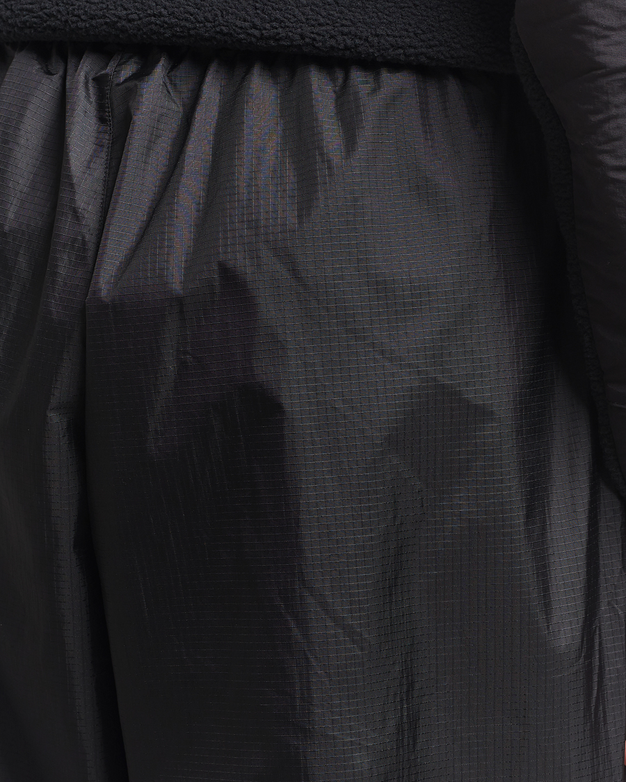 Mies | Housut | The North Face | NSE Wind Track Pants Black