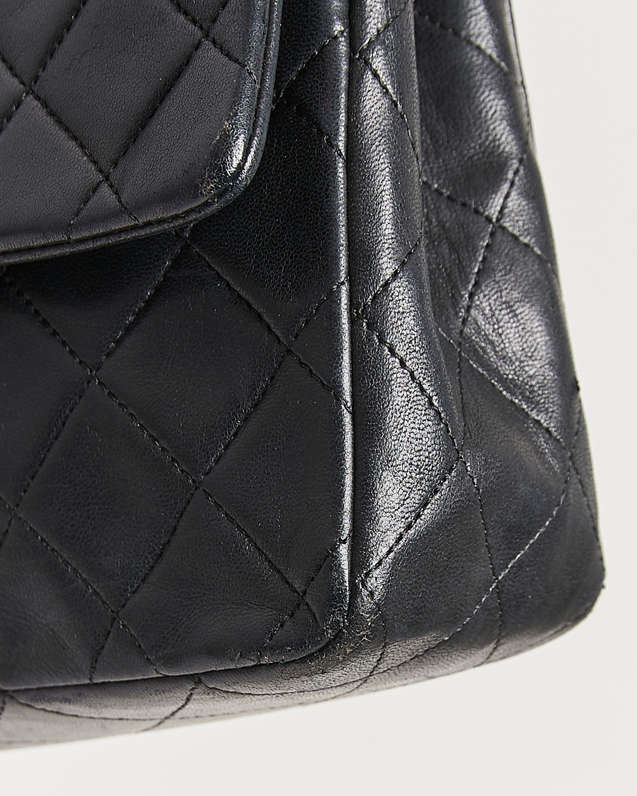 Mies | Chanel Pre-Owned Classic Medium Double Flap Bag Lambskin Black | Chanel Pre-Owned | Classic Medium Double Flap Bag Lambskin Black