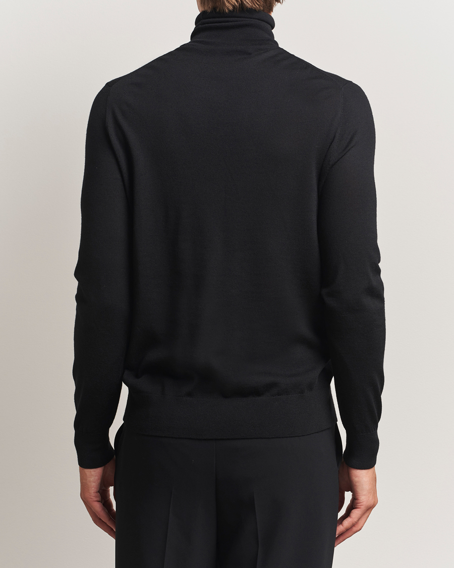 Mies | Puserot | Tiger of Sweden | Nevile Extra Fine Merino Polo Black
