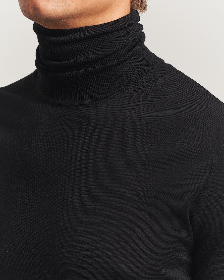 Mies | Puserot | Tiger of Sweden | Nevile Extra Fine Merino Polo Black