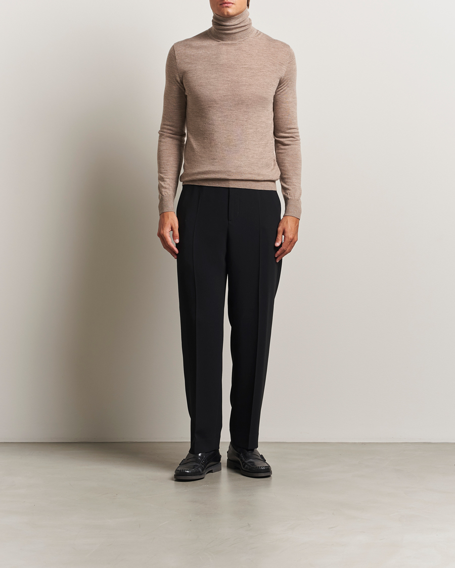 Mies | Puserot | Tiger of Sweden | Nevile Extra Fine Merino Polo Beige Melange