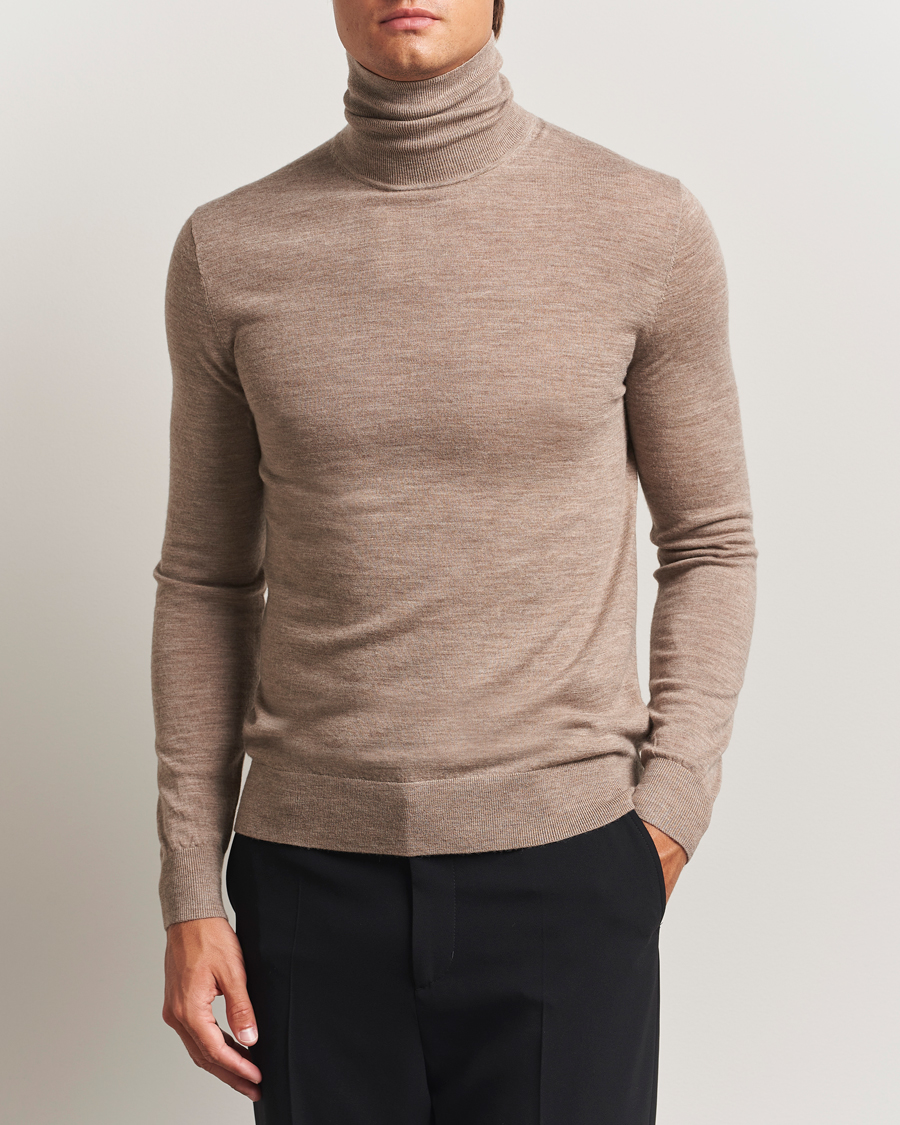 Mies | Puserot | Tiger of Sweden | Nevile Extra Fine Merino Polo Beige Melange