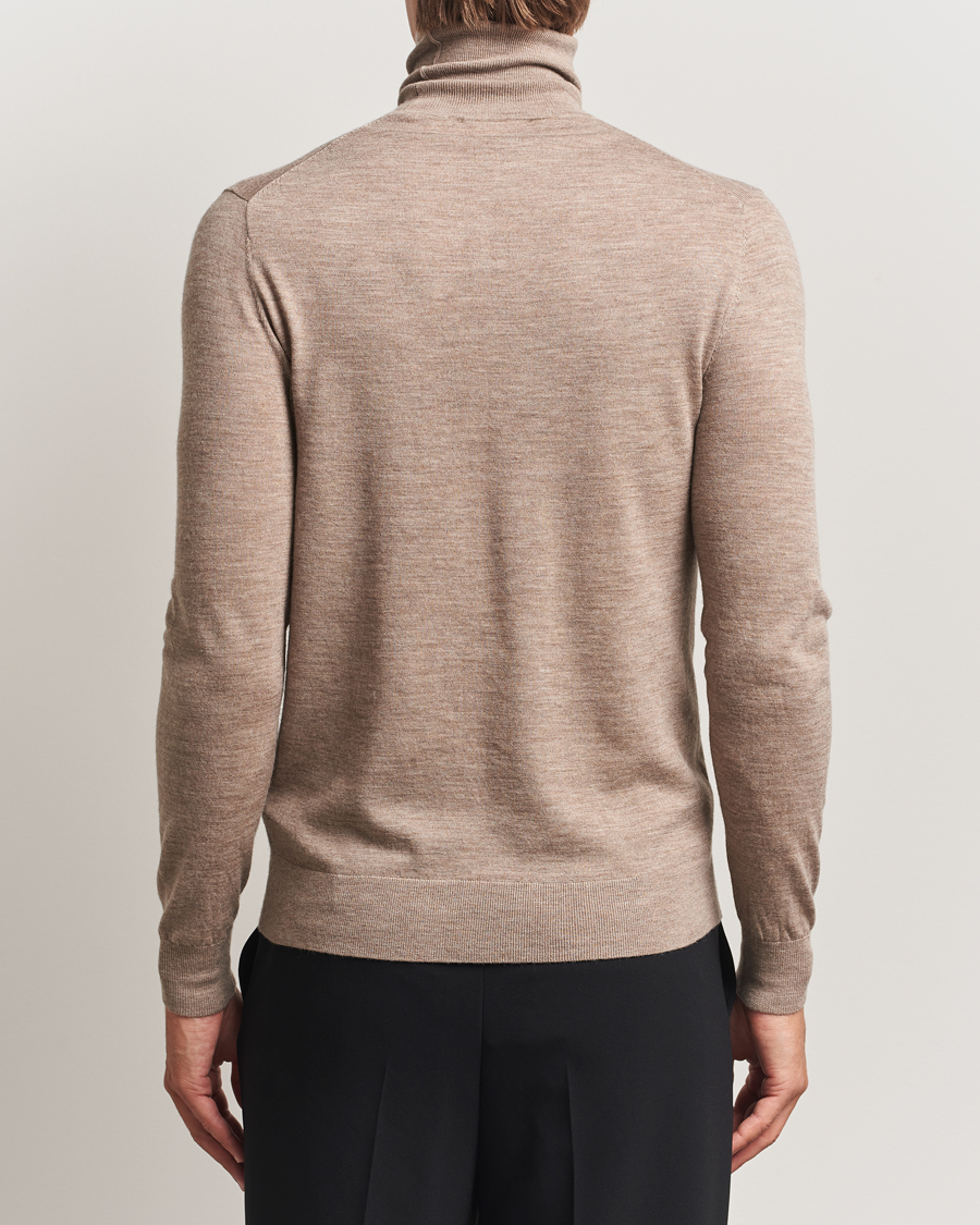 Mies | Puserot | Tiger of Sweden | Nevile Extra Fine Merino Polo Beige Melange